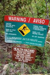 Various Warnings Advising Against Swimming in Hamilton Pool.jpg