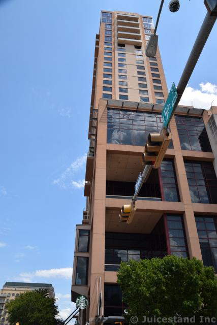 Hilton and E 5th Street Sign Austin