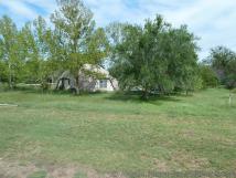 Semisphere house at Burnet Texas seen from train.jpg