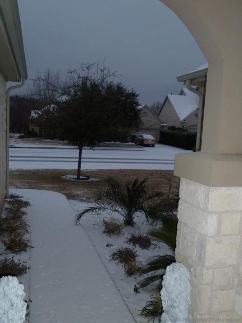 Roof roads covered with snow in Austin.jpg