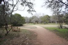 Trail surrounded by trees & grass at Hamilton Greenbelt in Lakeway Texas.jpg