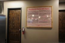 The Schmidt Family BBQ Story poster inside Schmidt Family BBQ Restaurant.jpg